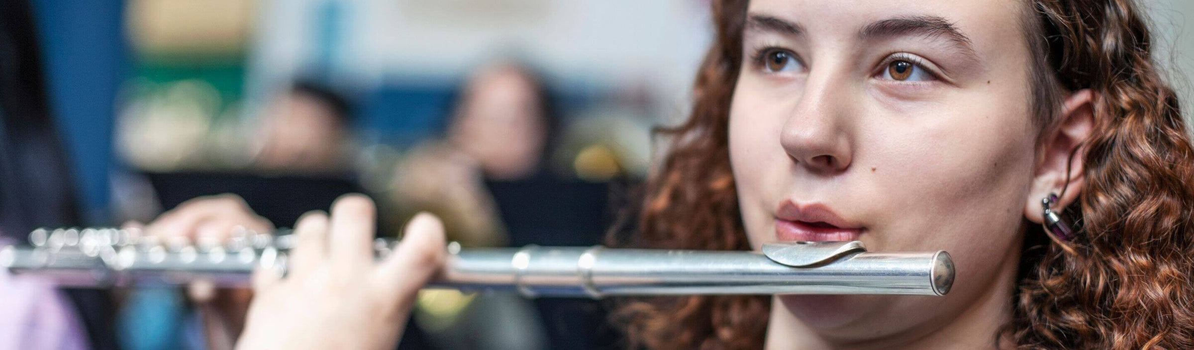 Musician playing flute.