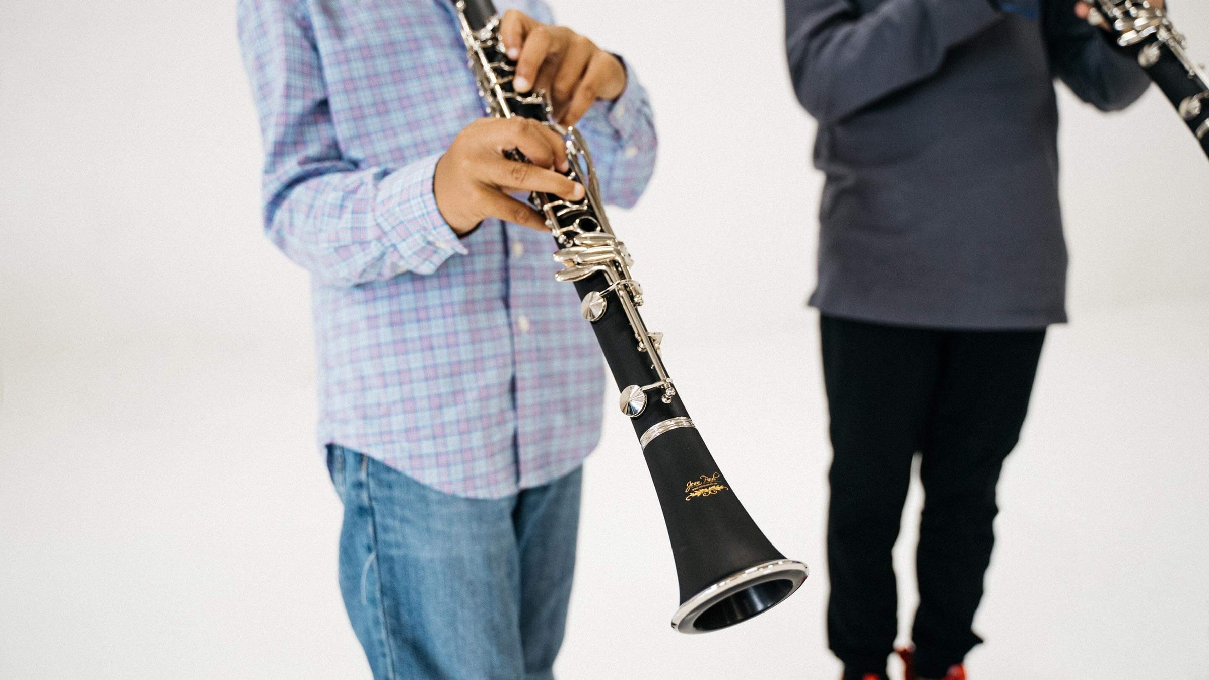 Students playing clarinet.